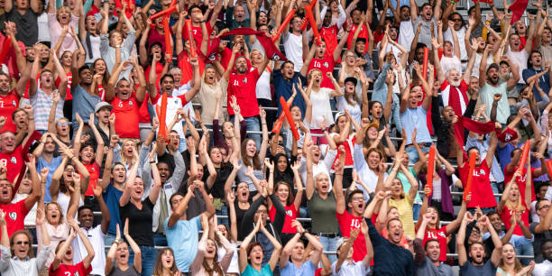 istock Group of spectators cheering in stadium 1130450693
