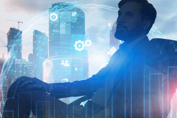 istock Bearded businessman in city, graph 1130453532