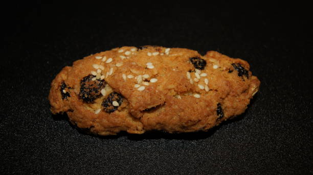 istock Bun with raisins and sesame 1130453650