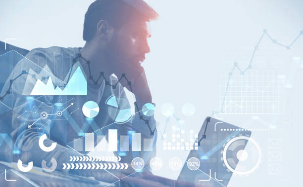 istock Businessman with laptop, infographics 1130454074