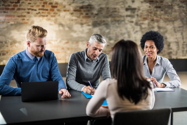 istock Human resource team with a candidate on a job interview. 1130454106