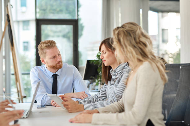 istock Small group of business having meeting. 1130454133