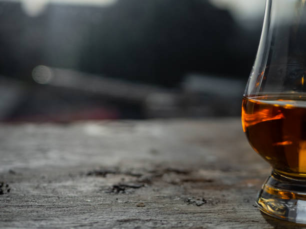 istock Irish whiskey Glass on Slate at Sunny Window 1130454852