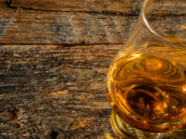 istock Irish Whiskey Glass and Water Jug on Textured Background 1130454889