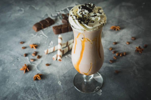 istock Sweet milkshake drink with dripping sauce, cream and chocolate 1130457680