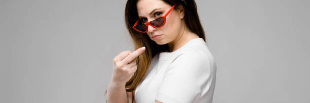 istock Attractive overweight woman in sunglasses 1130458098
