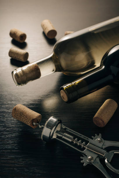 istock bottles of wine and corkscrew 1130458697