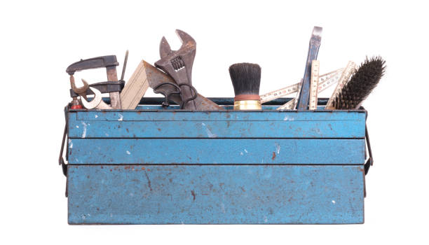 Old toolbox filled with vintage tools stock photo
