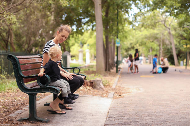 istock a Baby boy meets a squirrel. 1130461671