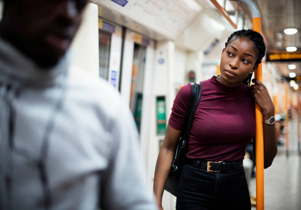 istock Woman riding the subway train 1130462296