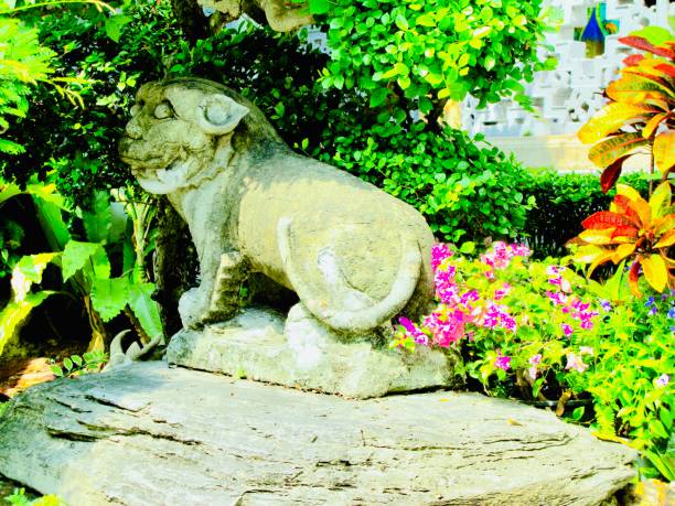 Lion Sculptures Decoration in A Beautiful Garden at Wat Phra Kaew Temple and The Grand Palace. Bangkok, Thailand.