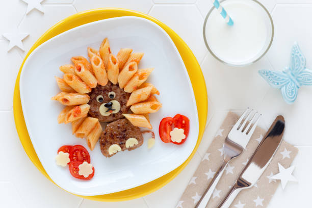 istock Cute lion shaped meat burger with pasta for kids 1130463618