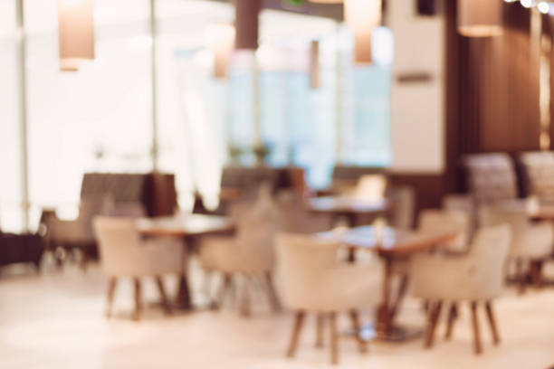 istock blur restaurant background, Blur coffee shop or cafe restaurant with abstract bokeh light 1130466394
