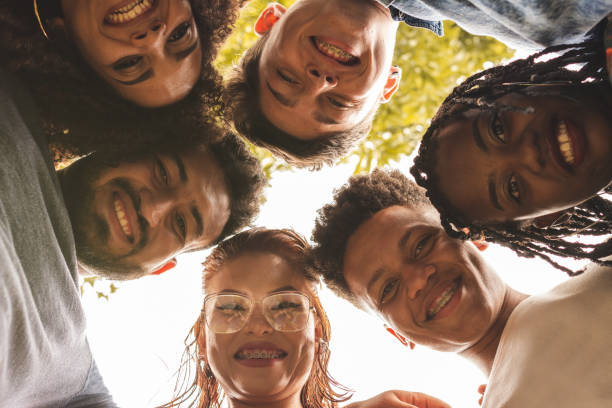 istock Multi-ethnic group of young smiling brazilian people 1130467595