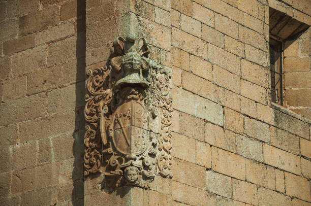 istock Family crest sculpture on a stone brick building at Caceres 1130468767