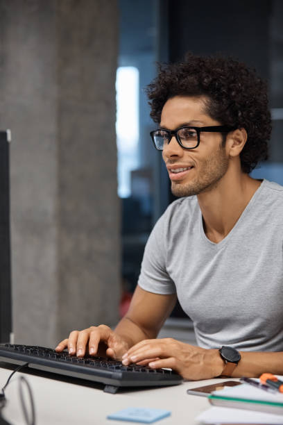 istock Businessman typing on keyboard at desk 1130470158