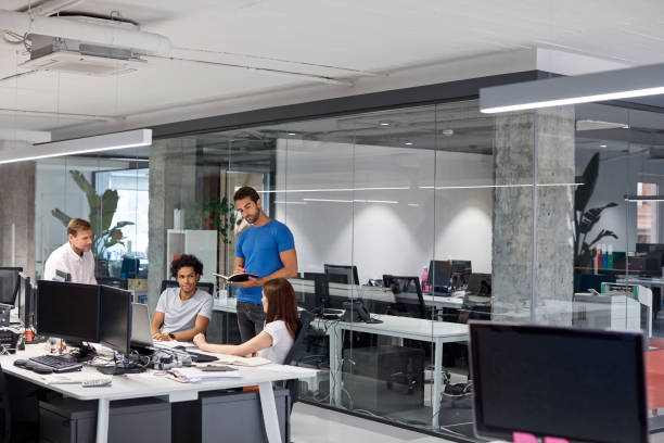istock Professionals discussing in meeting at office 1130470194