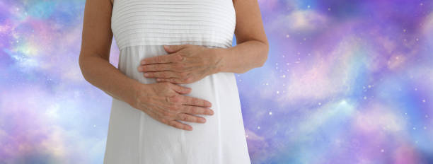 istock Giving my solar plexus and sacral chakra a self healing session 1130471459