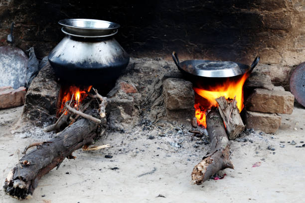 istock Cooking food on mud stove 1130471657