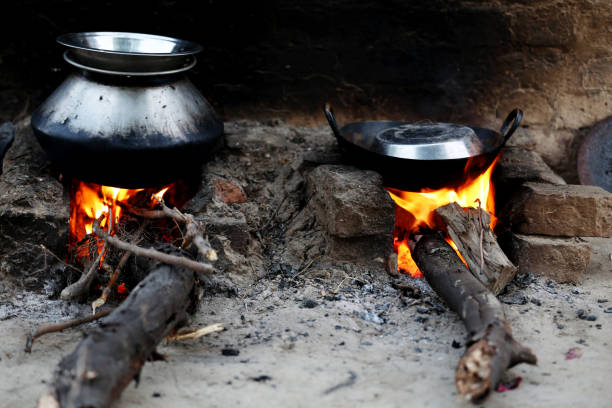 istock Cooking food on mud stove 1130471677