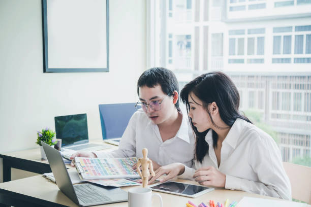 istock Architect or designer who plan work together in the office. 1130471702