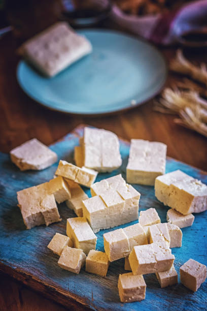 istock Preparing Tofu with Soy Sauce, Broccoli and Rice 1130474771