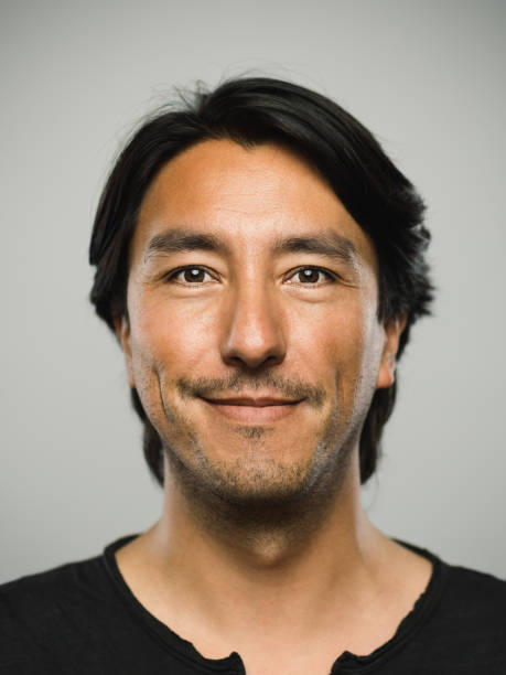 istock Portrait of real hispanic man with happy expression 1130475721
