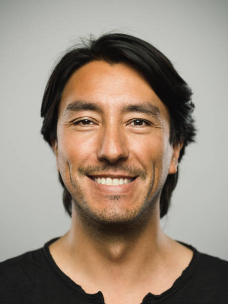 istock Portrait of real hispanic man with happy expression 1130475760