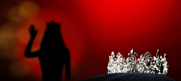 Silver Diamond Crown of Miss Pageant Beauty Universe World Contest sparkle light on black pillow, ready for wear Most beautiful Winner, studio lighting super red gradient background dramatic