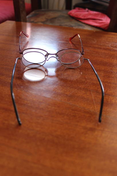 istock Reading glasses with mobile phone 1130478873