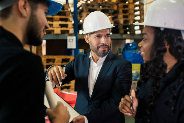 istock Business people in warehouse 1130479294