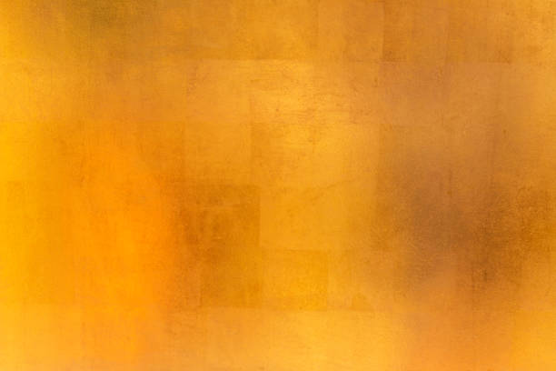 istock Shiny yellow leaf gold metall texture and background 1130483786