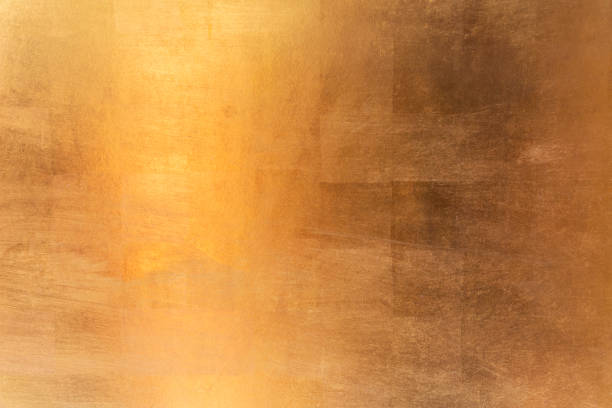 istock Shiny yellow leaf gold metall texture and background 1130484322