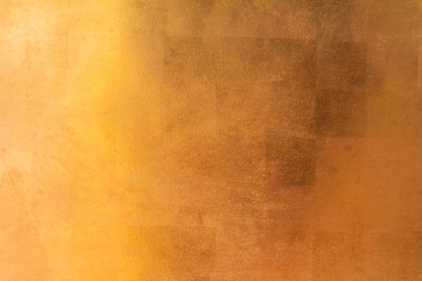 istock Shiny yellow leaf gold metall texture and background 1130484550