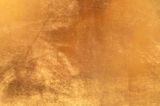 istock Shiny yellow leaf gold metall texture and background 1130484611