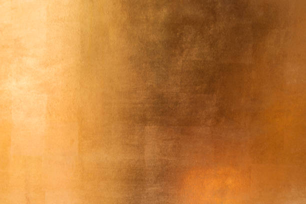 istock Shiny yellow leaf gold metall texture and background 1130484635
