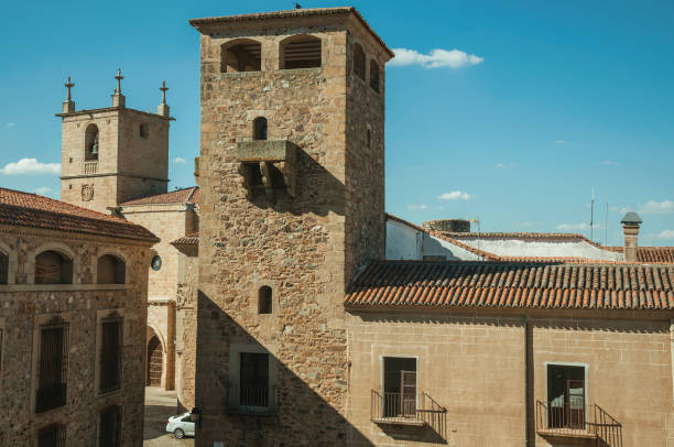istock Stone tower and gothic steeple church at Caceres 1130485004