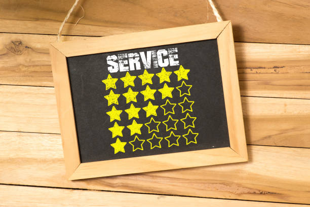 A chalkboard and rating stars for service A chalkboard and rating stars for the service enttäuschung stock pictures, royalty-free photos & images