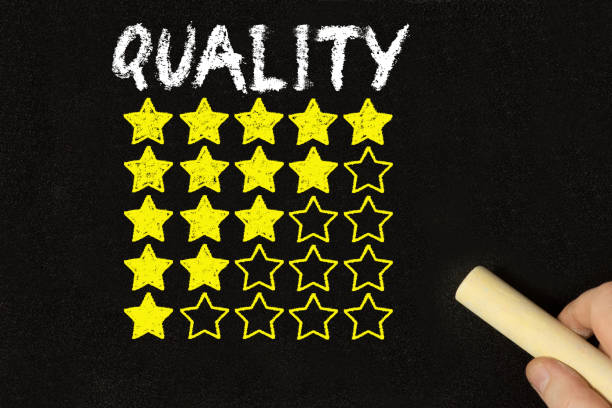 A man, a chalkboard and rating of quality with stars A man, a chalkboard and rating of quality with stars enttäuschung stock pictures, royalty-free photos & images