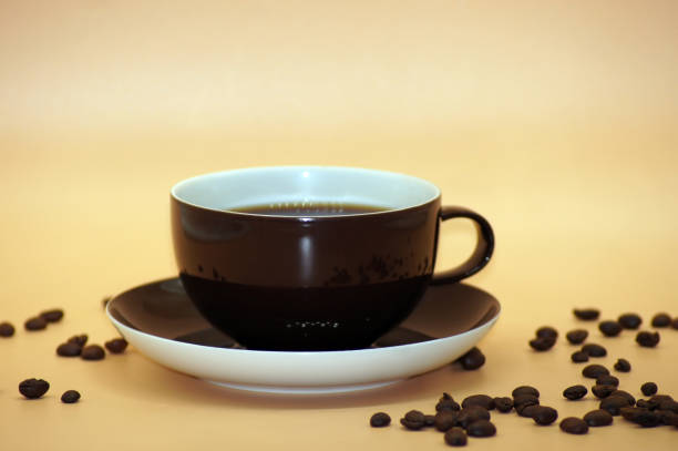 istock Coffee with milk freed on neutral background 1130493058