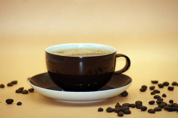 istock Coffee with milk freed on neutral background 1130493093