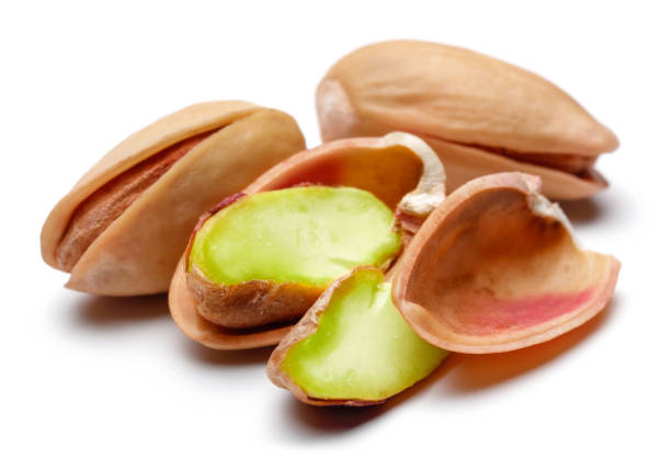 istock Fresh pistachio nuts isolated on white 1130500052
