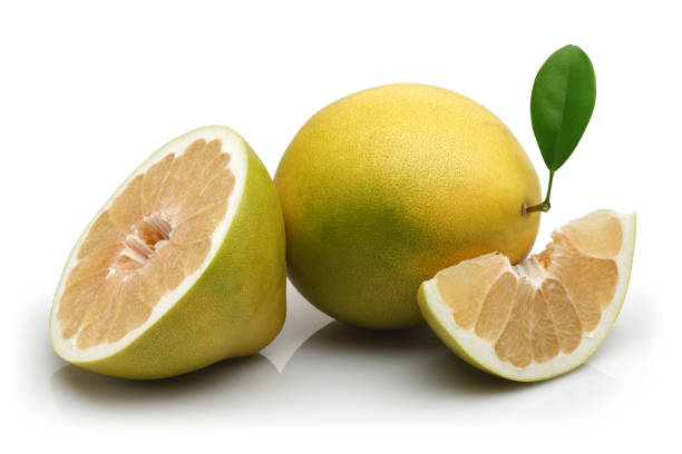 istock Fresh pomelo fruits isolated on white 1130501248