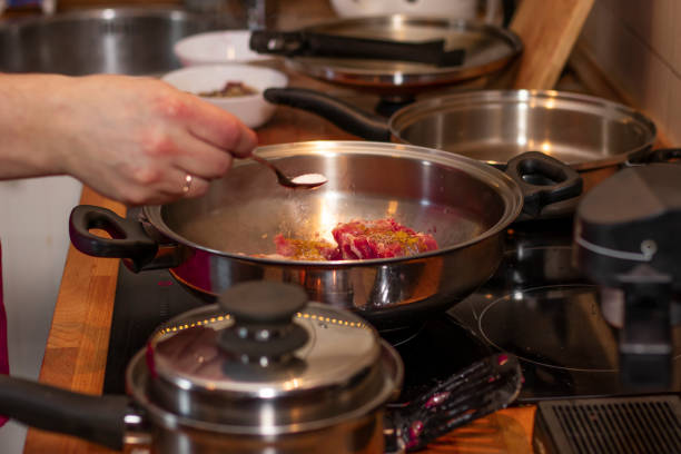 istock cook preparing lamb soup with vegetables in the kitchen 1130504307