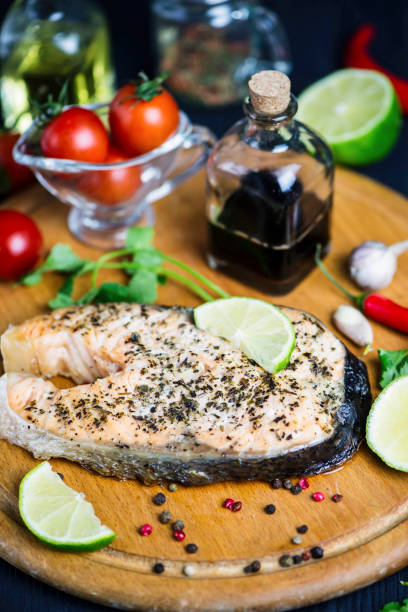 istock red fish salmon baked with spices and lemon 1130505266