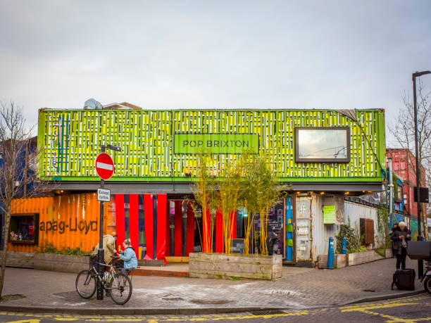 Pop Brixton, London Pop Brixton, a part of Brixton Market consisting of food and drinks stalls set in shipping container construction brixton stock pictures, royalty-free photos & images