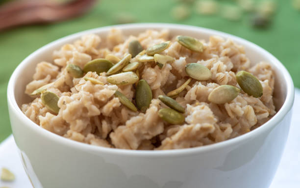 istock Oatmeal with pumpkin seeds 1130505347
