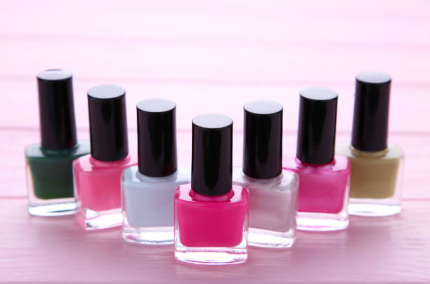 istock Group of bright nail polishes on pink 1130507585