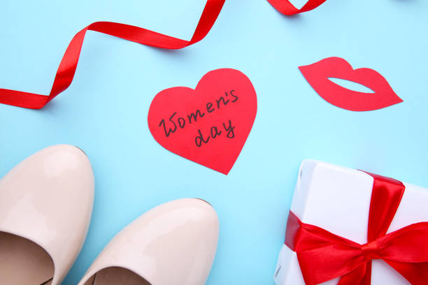 istock Womens Day concept with accessories on blue background 1130508923