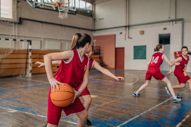 istock Young girls playing basketball 1130513133